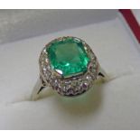 EMERALD AND DIAMOND CLUSTER RING,