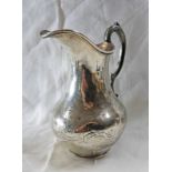 SILVER JUG WITH ENGRAVED DECORATION LONDON 1857 Condition Report: Small dent to side