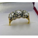 18CT GOLD 3 STONE DIAMOND SET RING. THE 3 BRILLIANT CUT DIAMONDS TOTALLING 2.15 CARAT APPROX.