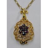 9CT GOLD GARNET SET PENDANT ON 9CT GOLD CHAIN