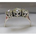 3 STONE DIAMOND SET RING MARKED PLAT. THE DIAMONDS APPROXIMATELY 1.