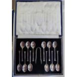CASED SET OF 12 SILVER TEASPOONS AND TONGS.