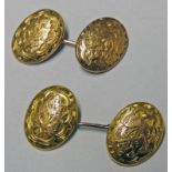 PAIR OF 9CT GOLD CUFF LINKS WITH LEAF DECORATION Condition Report: Weight: 5.