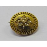 19TH CENTURY YELLOW METAL OVAL SEED PEARL SET DECORATIVE BROOCH