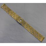 18 CT GOLD BUECHE GIRODA WATCH 67 GMS Condition Report: In good condition,
