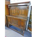 19TH CENTURY STYLE CARVED OAK COURT CUPBOARD WITH 2 LINEN FOLD DOORS OVER SINGLE CARVED PANEL DOOR