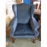 LATE 19TH CENTURY WINGBACK ARMCHAIR ON BALL AND CLAW SUPPORTS