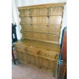ERCOL WELSH DRESSER WITH PLATE RACK BACK OVER 3 DRAWERS OVER 3 PANEL DOORS Condition