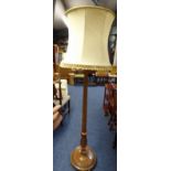 20TH CENTURY WALNUT STANDARD LAMP WITH REEDED COLUMN