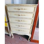 20TH CENTURY CREAM CHEST OF 5 DRAWERS ON SHAPED SUPPORTS