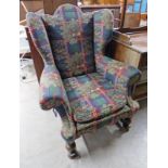 LATE 19TH CENTURY LUG ARMCHAIR ON TURNED SUPPORTS