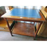 20TH CENTURY MAHOGANY LEATHER TOPPED WRITING TABLE ON SHAPED SUPPORTS