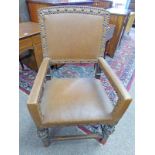 19TH CENTURY STYLE OAK AND LEATHER OPEN ARMCHAIR WITH BRASS STUD DECORATION ON BALUSTER SUPPORTS