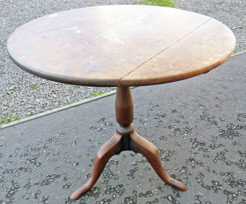 19TH CENTURY MAHOGANY FLIP TOP TABLE ON SPREADING SUPPORTS