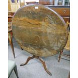 19TH CENTURY OAK FLIP TOP CIRCULAR TABLE WITH SPREADING SUPPORTS