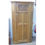EARLY 20TH CENTURY OAK HALL CUPBOARD WITH CARVED DECORATION & PANEL DOOR