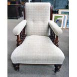 LATE 19TH CENTURY MAHOGANY LIBRARY ARMCHAIR ON TURNED SUPPORTS