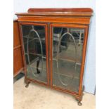 LATE 19TH CENTURY INLAID MAHOGANY BOOKCASE WITH 2 ASTRAGAL GLAZED DOORS ON SHORT QUEEN ANNE
