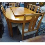 OVAL TEAK DINING TABLE AND 6 CHAIRS