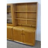 TEAK ERCOL CABINET WITH SHELVES OVER 2 PANEL DOORS Condition Report: 162cm tall,