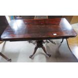 19TH CENTURY ROSEWOOD TURNOVER TEA TABLE WITH CARVED PEDESTAL & 4 SPREADING SUPPORTS