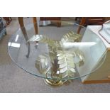 CIRCULAR GLASS TOPPED TABLE ON METAL LEAF BASE Condition Report: 80cm across.