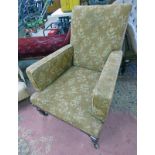 19TH CENTURY OVERSTUFFED ARMCHAIR ON TURNED SUPPORTS