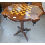19TH CENTURY WALNUT GAMES TABLE WITH ROSEWOOD & SATINWOOD CHEQUER BOARD TOP ON CARVED SUPPORTS