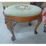 EARLY 20TH CENTURY WALNUT OVAL TAPESTRY TOPPED STOOL ON BALL SUPPORTS