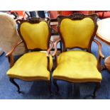 PAIR OF EARLY 20TH CENTURY MAHOGANY FRAMED ARMCHAIRS ON SHAPED SUPPORTS