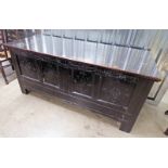 19TH CENTURY OAK COFFER WITH 4 CARVED PANELS WITH "HEWETSON,