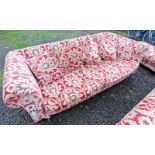 LARGE OVERSTUFFED SETTEE ON TURNED SUPPORTS Condition Report: 115cm deep,