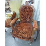 LATE 19TH CENTURY WALNUT GENTLEMAN'S ARMCHAIR ON TURNED SUPPORTS