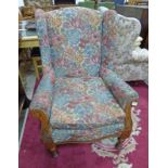 LATE 19TH CENTURY WINGBACK ARMCHAIR ON TURNED SUPPORTS