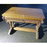 19TH CENTURY CARVED OAK CENTRE TABLE WITH DOLPHIN SUPPORTS