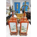 PAIR CHINESE RED & GILT TABLE LAMPS WITH RIVER SCENE DECORATION & HARDWOOD BASES 55CM TALL