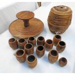 CARVED WOODEN BARREL WITH METAL TAP AND A SELECTION OF CARVED WOODEN DRINKING CUPS ETC