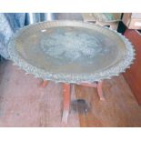 MIDDLE EASTERN BRASS TOPPED TABLE WITH FRILLED EDGE Condition Report: 86cm across