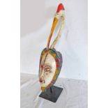 WEST AFRICAN MASK MOUNTED WITH STORK TYPE BIRDS HEAD, WHITE FACE,