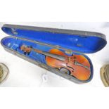VIOLIN WITH 2 PIECE BACK AND LABEL THAT READS " ANTONIAS STRADIVERIUS CREMONENFIS FACIEBET AMO" IN