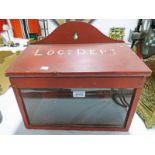 RED PAINTED WOODEN GLASS FRONTED BOX WITH "LOCO DEPT" PAINTED IN WHITE TO TOP OF LID