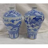 PAIR CHINESE BLUE & WHITE POTTERY VASES DECORATED WITH DRAGONS,