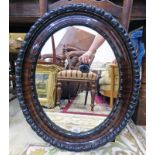 OVAL MAHOGANY FRAMED MIRROR 50 X 38CM Condition Report: Carved wooden frame