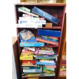 SELECTION OF VARIOUS BOARD GAMES & JIGSAW PUZZLES OVER FOUR SHELVES
