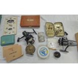 BRASS 3 1/4 INCH REEL, DAIWA A1600 SPINNING REEL, 1 OTHER 2 ALLOY FLY TINS,