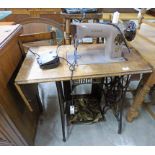 SINGER SEWING MACHINE ON OAK TREADLE