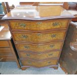 20TH CENTURY WALNUT CHEST OF 5 DRAWERS WITH SERPENTINE FRONT AND BRACKET SUPPORTS 107CM TALL