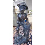 AFRICAN CARVED HARDWOOD FIGURE OF A FISHERMAN - 39CM TALL