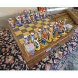 LATE 20TH CENTURY TRIBAL STYLE CHESS SET AND BOARD WITH FITTED INTERIOR Condition Report: