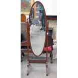 MAHOGANY CHEVAL MIRROR ON SPREADING SUPPORTS